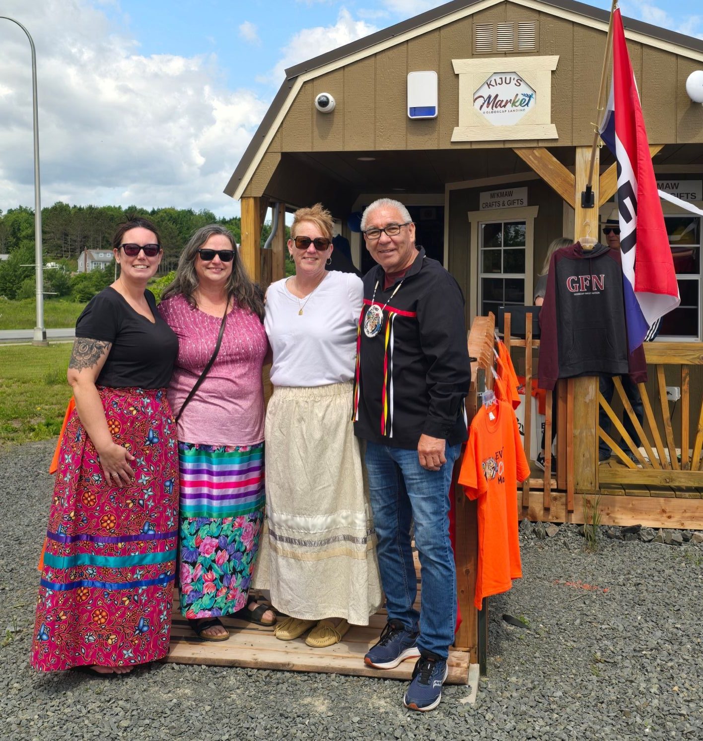 Community members outside Kiju's Market